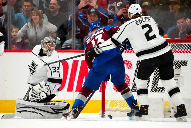Apr 13, 2022; Denver, Colorado, USA; Colorado Avalanche right wing Valeri Nichushkin (13) scores past Los Angeles Kings goaltender Jonathan Quick (32) and defenseman Alexander Edler (2) in the first period at Ball Arena. Mandatory Credit: Ron Chenoy-USA TODAY Sports