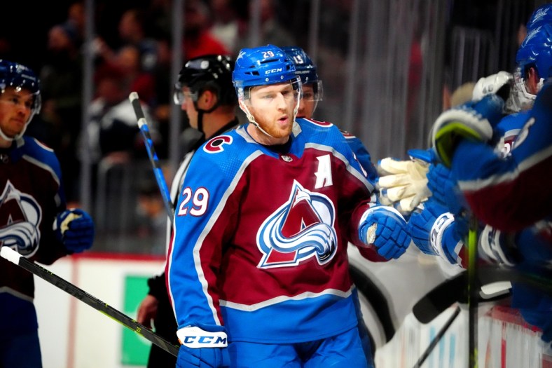 Apr 13, 2022; Denver, Colorado, USA; Colorado Avalanche center Nathan MacKinnon (29) celebrates his goal in the first period against the Los Angeles Kings at Ball Arena. Mandatory Credit: Ron Chenoy-USA TODAY Sports