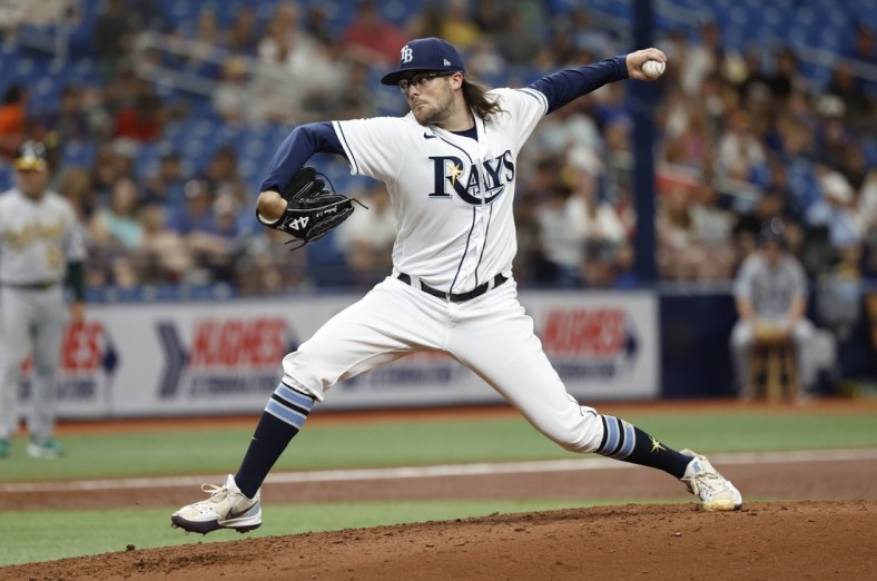 Apr 14, 2022; St. Petersburg, Florida, USA; Tampa Bay Rays relief pitcher Josh Fleming (19) throws a pitch during the third inning against the Oakland Athletics at Tropicana Field. Mandatory Credit: Kim Klement-USA TODAY Sports