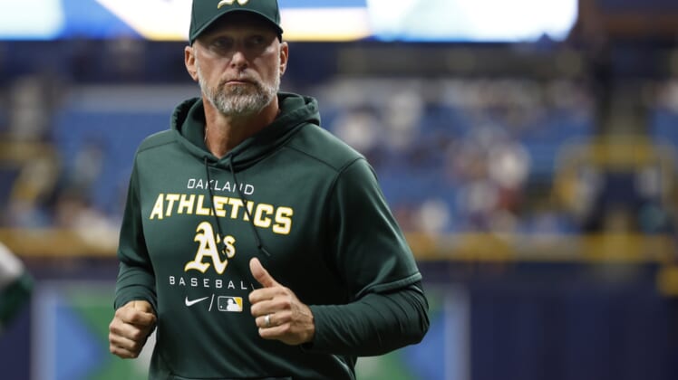 Apr 14, 2022; St. Petersburg, Florida, USA;  Oakland Athletics manager Mark Kotsay (7) looks on during the ninth inning against the Tampa Bay Rays at Tropicana Field. Mandatory Credit: Kim Klement-USA TODAY Sports