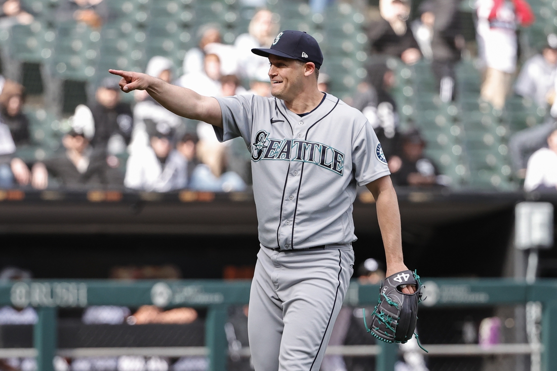 Apr 14, 2022; Chicago, Illinois, USA; Seattle Mariners relief pitcher Paul Sewald (37) celebrates team's 5-1 win against the Chicago White Sox at Guaranteed Rate Field. Mandatory Credit: Kamil Krzaczynski-USA TODAY Sports