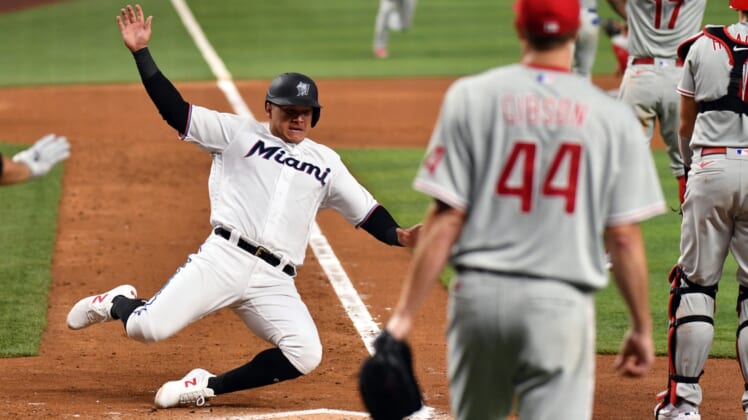 Apr 14, 2022; Miami, Florida, USA; Miami Marlins right fielder Avisail Garcia (24) scores a run in the fourth inning against the Philadelphia Phillies at loanDepot Park. Mandatory Credit: Jim Rassol-USA TODAY Sports