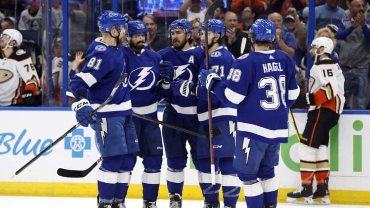Apr 14, 2022; Tampa, Florida, USA; Tampa Bay Lightning left wing Alex Killorn (17) is congratulated by center Anthony Cirelli (71), defenseman Ryan McDonagh (27) and teammates after scoring a goal against the Anaheim Ducks during the first period at Amalie Arena. Mandatory Credit: Kim Klement-USA TODAY Sports