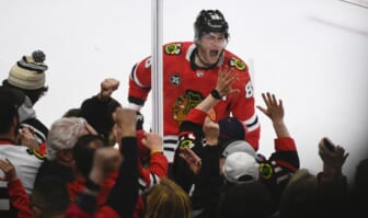 Apr 14, 2022; Chicago, Illinois, USA; Chicago Blackhawks right wing Patrick Kane (88) celebrates after he  scores a goal against San Jose Sharks goaltender James Reimer (47) during the first period at the United Center. Mandatory Credit: Matt Marton-USA TODAY Sports