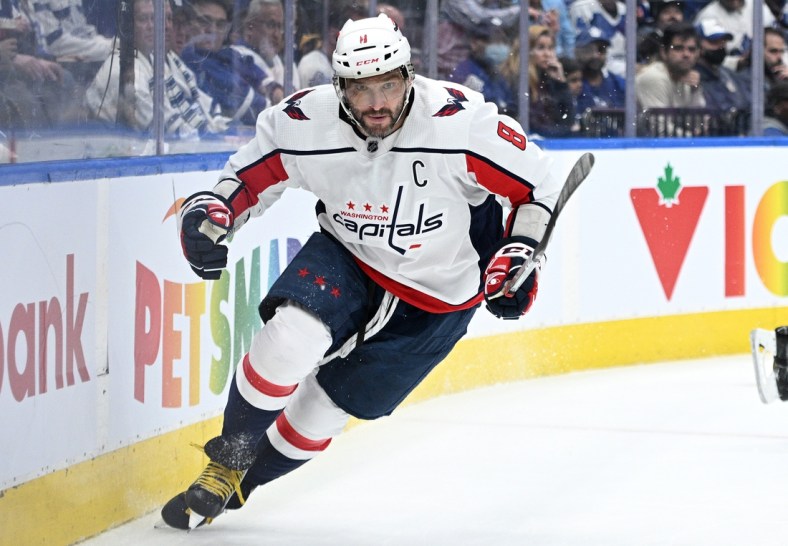 Apr 14, 2022; Toronto, Ontario, CAN;   Washington Capitals forward Alex Ovechkin (8) pursues the play against the Toronto Maple Leafs in the third period at Scotiabank Arena. Mandatory Credit: Dan Hamilton-USA TODAY Sports
