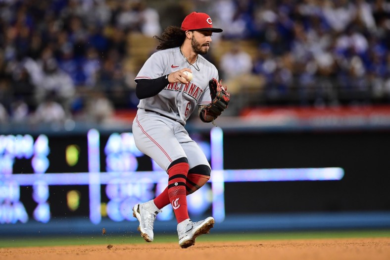 Apr 14, 2022; Los Angeles, California, USA; Cincinnati Reds second baseman Jonathan India (6) throws to first for the out against Los Angeles Dodgers catcher Will Smith (16) during the fourth inning at Dodger Stadium. Mandatory Credit: Gary A. Vasquez-USA TODAY Sports