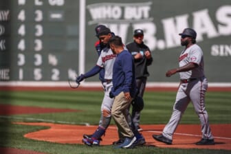 Apr 15, 2022; Boston, Massachusetts, USA; Minnesota Twins center fielder Byron Buxton (25) reacts during the first inning after getting injured against the Boston Red Sox at Fenway Park. Every player is wearing number 42 in honor of Jackie Robinson. Mandatory Credit: Paul Rutherford-USA TODAY Sports