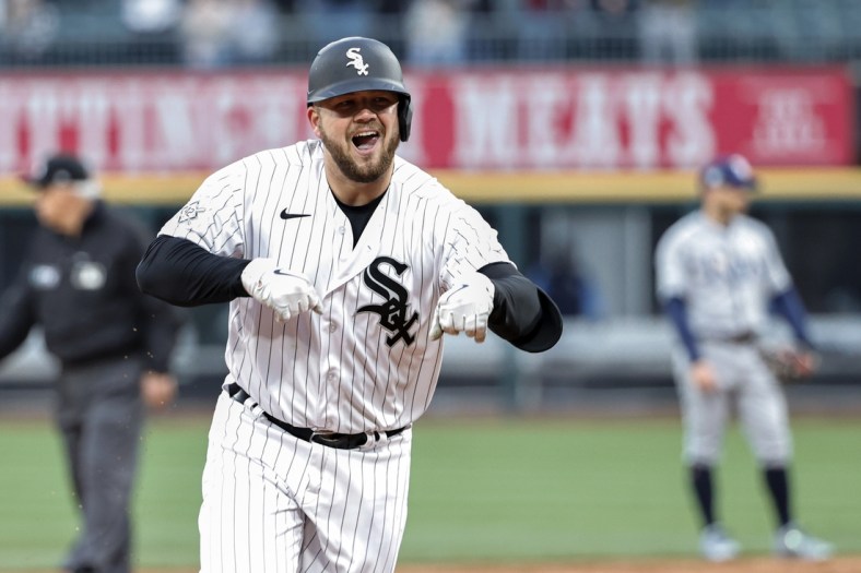 Apr 15, 2022; Chicago, Illinois, USA; Chicago White Sox third baseman Jake Burger (30) rounds the bases after hitting a solo home run against the Tampa Bay Rays during the third inning at Guaranteed Rate Field. Mandatory Credit: Kamil Krzaczynski-USA TODAY Sports