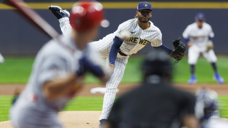 Apr 15, 2022; Milwaukee, Wisconsin, USA;  Milwaukee Brewers pitcher Freddy Peralta (42) throws a pitch during the first inning against the St. Louis Cardinals at American Family Field. Mandatory Credit: Jeff Hanisch-USA TODAY Sports