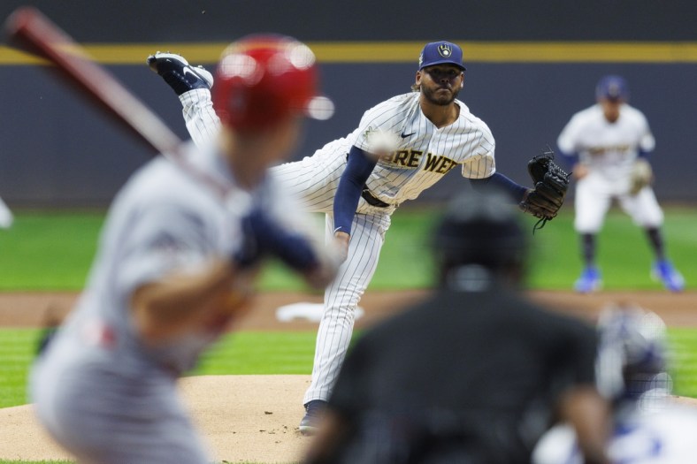 Apr 15, 2022; Milwaukee, Wisconsin, USA;  Milwaukee Brewers pitcher Freddy Peralta (42) throws a pitch during the first inning against the St. Louis Cardinals at American Family Field. Mandatory Credit: Jeff Hanisch-USA TODAY Sports