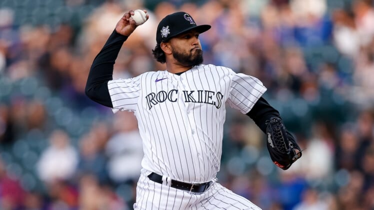 Apr 15, 2022; Denver, Colorado, USA; Colorado Rockies starting pitcher German Marquez pitches in the first inning against the Chicago Cubs at Coors Field. Mandatory Credit: Isaiah J. Downing-USA TODAY Sports