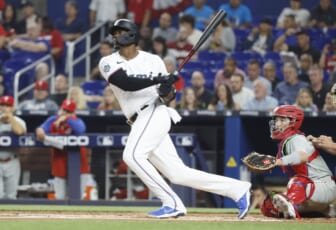 Apr 15, 2022; Miami, Florida, USA; Miami Marlins left fielder Jorge Soler follows through on his double during the first inning against the Philadelphia Phillies at loanDepot Park. Mandatory Credit: Rhona Wise-USA TODAY Sports