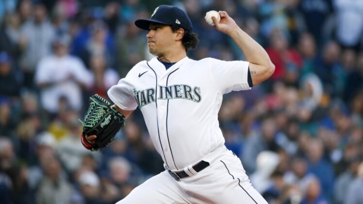 Apr 15, 2022; Seattle, Washington, USA; Seattle Mariners starting pitcher Marco Gonzales (42) throws against the Houston Astros during the first inning at T-Mobile Park. Mandatory Credit: Joe Nicholson-USA TODAY Sports