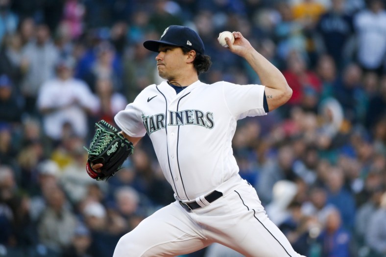 Apr 15, 2022; Seattle, Washington, USA; Seattle Mariners starting pitcher Marco Gonzales (42) throws against the Houston Astros during the first inning at T-Mobile Park. Mandatory Credit: Joe Nicholson-USA TODAY Sports