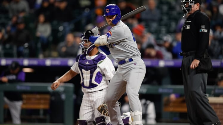 Apr 15, 2022; Denver, Colorado, USA; Chicago Cubs pinch hitter Seiya Suzuki takes a swing before stepping into the batters box in the fifth inning against the Colorado Rockies at Coors Field. Mandatory Credit: Isaiah J. Downing-USA TODAY Sports