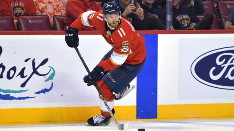 Apr 15, 2022; Sunrise, Florida, USA;  Florida Panthers left wing Jonathan Huberdeau (11) crosses the blue line during the second period against the Winnipeg Jets at FLA Live Arena. Mandatory Credit: Jim Rassol-USA TODAY Sports