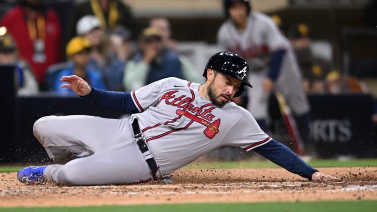 Apr 15, 2022; San Diego, California, USA; Atlanta Braves catcher Travis d'Arnaud scores a run on a two-RBI double hit by center fielder Adam Duvall (not pictured) during the eighth inning against the San Diego Padres at Petco Park. Mandatory Credit: Orlando Ramirez-USA TODAY Sports