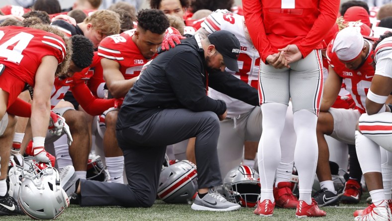 Apr 16, 2022; Columbus, Ohio, USA; Ohio State Buckeyes head coach Ryan Day has a moment of silence for Dwayne Haskins during the Annual Scarlett and Gray Spring game at Ohio Stadium. Mandatory Credit: Joseph Maiorana-USA TODAY Sports