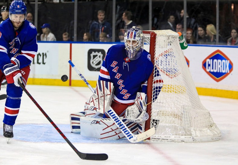 Apr 16, 2022; New York, New York, USA; New York Rangers goalie Igor Shesterkin (31) makes a save against the Detroit Red Wings during the third period at Madison Square Garden. Mandatory Credit: Danny Wild-USA TODAY Sports