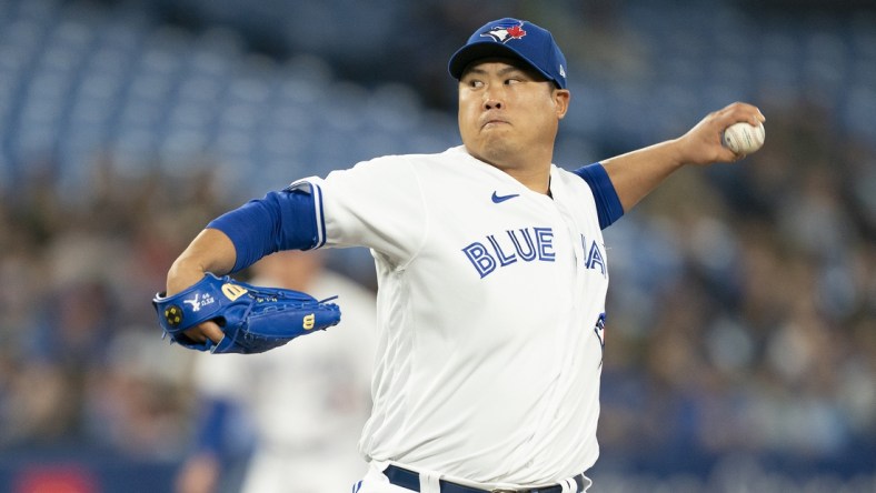 Apr 16, 2022; Toronto, Ontario, CAN; Toronto Blue Jays starting pitcher Hyun Jin Ryu (99) throws a pitch during the first inning against the Oakland Athletics at Rogers Centre. Mandatory Credit: Nick Turchiaro-USA TODAY Sports