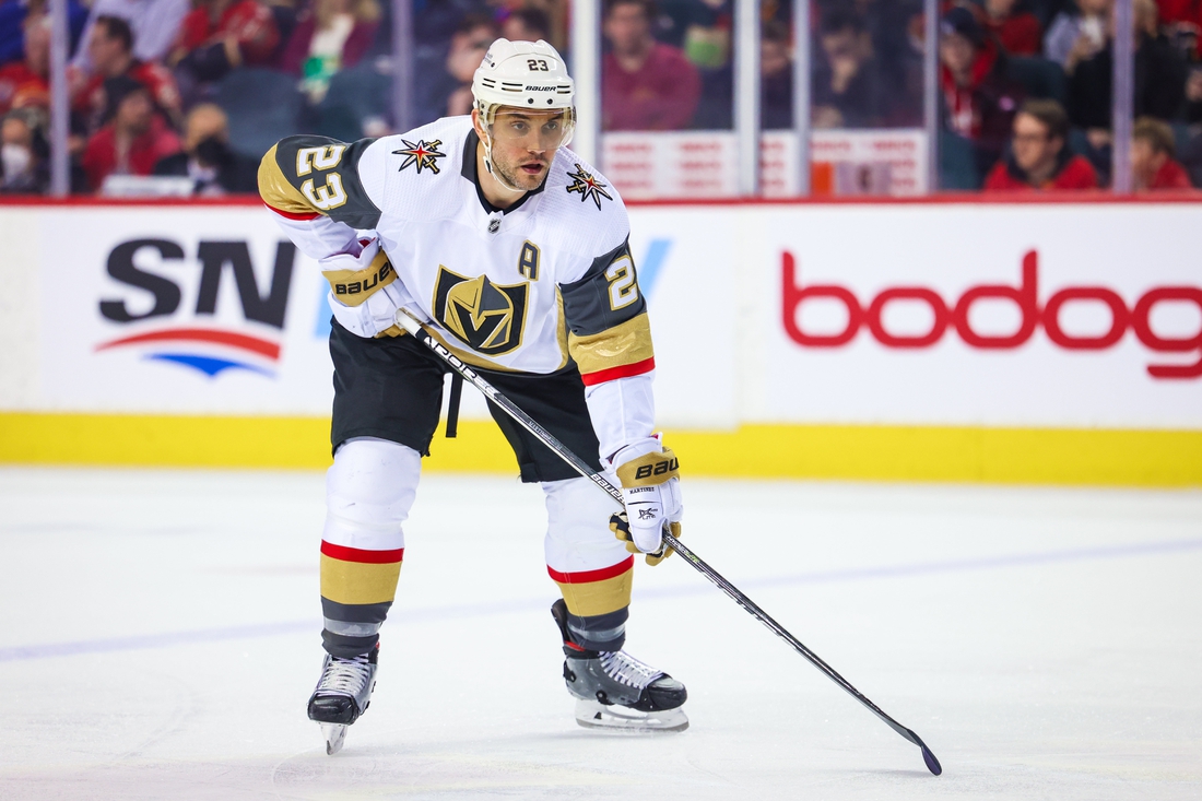 Apr 14, 2022; Calgary, Alberta, CAN; Vegas Golden Knights defenseman Alec Martinez (23) during the face off against the Calgary Flames during the second period at Scotiabank Saddledome. Mandatory Credit: Sergei Belski-USA TODAY Sports