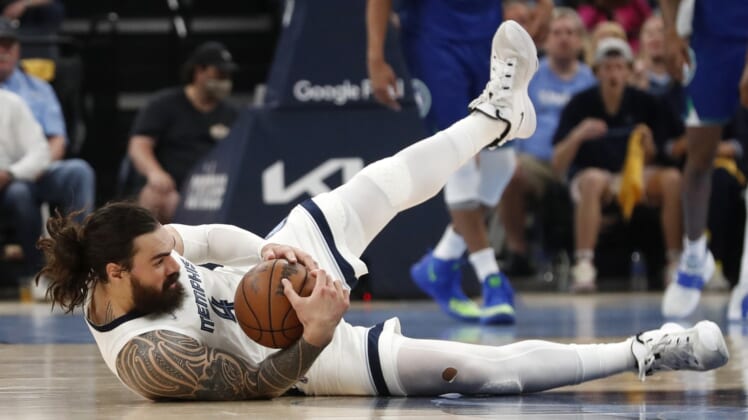 Apr 16, 2022; Memphis, Tennessee, USA; Memphis Grizzlies center Steven Adams (4) falls to catch the ball during the first half of game one of the first round for the 2022 NBA playoffs against the Minnesota Timberwolves at FedExForum. Mandatory Credit: Christine Tannous-USA TODAY Sports