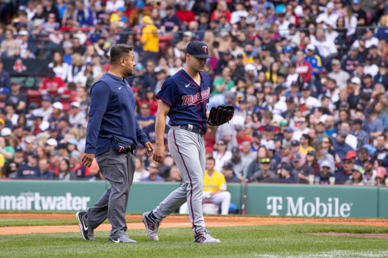 Apr 16, 2022; Boston, Massachusetts, USA; Minnesota Twins starting pitcher Sonny Gray (54) walks off the field during the second inning against the Boston Red Sox at Fenway Park. Mandatory Credit: Paul Rutherford-USA TODAY Sports