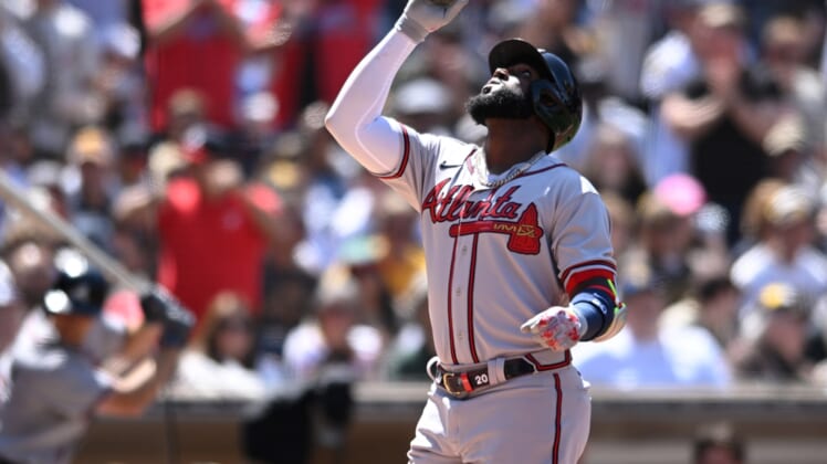 Apr 16, 2022; San Diego, California, USA; Atlanta Braves left fielder Marcell Ozuna (20) gestures after hitting a home run against the San Diego Padres during the fifth inning at Petco Park. Mandatory Credit: Orlando Ramirez-USA TODAY Sports