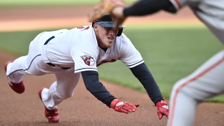 Apr 16, 2022; Cleveland, Ohio, USA; Cleveland Guardians center fielder Myles Straw (7) slides into third with a triple during the first inning against the San Francisco Giants at Progressive Field. Mandatory Credit: Ken Blaze-USA TODAY Sports