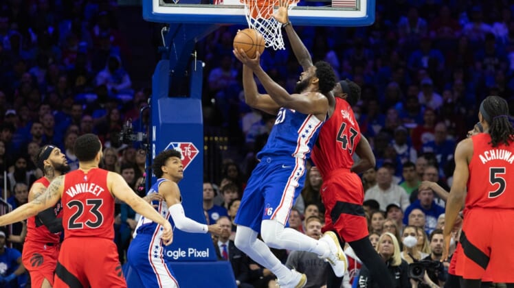 Apr 16, 2022; Philadelphia, Pennsylvania, USA; Philadelphia 76ers center Joel Embiid (21) drives for a shot against Toronto Raptors forward Pascal Siakam (43) during the first quarter of game one of the first round for the 2022 NBA playoffs at Wells Fargo Center. Mandatory Credit: Bill Streicher-USA TODAY Sports