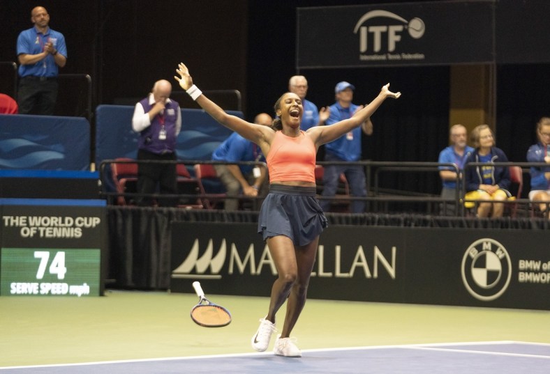 Apr 16, 2022; Asheville, NC, USA;  Asia Muhammad (USA) celebrates after winning the doubles with Jessica Pegula (USA) in the Billie Jean King Cup tie between USA and Ukraine at Harrah's Cherokee Center. Mandatory Credit: Susan Mullane-USA TODAY Sports