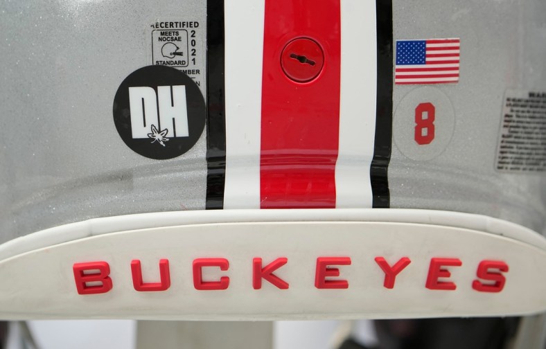 A sticker honoring the late Dwayne Haskins adorns helmets of Ohio State Buckeyes players during the spring football game at Ohio Stadium. Mandatory Credit: Adam Cairns-The Columbus Dispatch

Ncaa Football Ohio State Spring Game