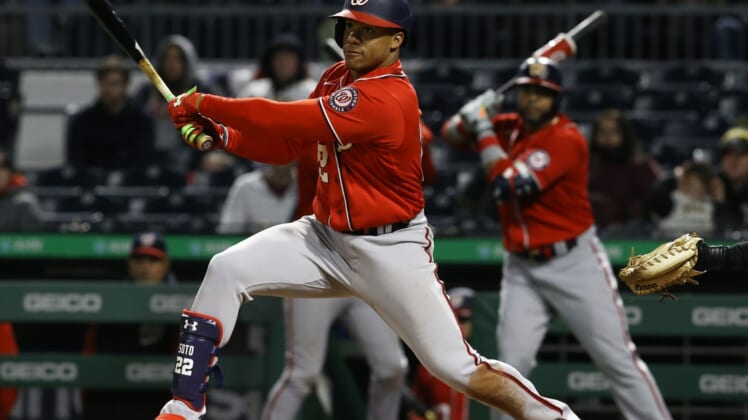 Apr 16, 2022; Pittsburgh, Pennsylvania, USA;  Washington Nationals left fielder Juan Soto (22) hits a double against the Pittsburgh Pirates during the ninth inning at PNC Park. Pittsburgh won 6-4. Mandatory Credit: Charles LeClaire-USA TODAY Sports
