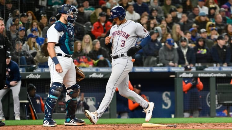 Apr 16, 2022; Seattle, Washington, USA; Houston Astros shortstop Jeremy Pena (3) scores a run off a single hit by second baseman Jose Altuve (27)  (not pictured) during the seventh inning at T-Mobile Park. Mandatory Credit: Steven Bisig-USA TODAY Sports