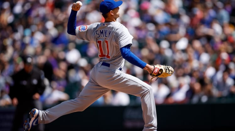 Apr 17, 2022; Denver, Colorado, USA; Chicago Cubs starting pitcher Drew Smyly (11) pitches in the first inning against the Colorado Rockies at Coors Field. Mandatory Credit: Isaiah J. Downing-USA TODAY Sports