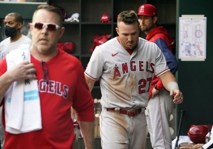 Apr 17, 2022; Arlington, Texas, USA; Los Angeles Angels center fielder Mike Trout (27) heads for the locket room after being hit by a pitch on the left wrist by Texas Rangers relief pitcher Spencer Patton during the fifth inning at Globe Life Field. Mandatory Credit: Raymond Carlin III-USA TODAY Sports