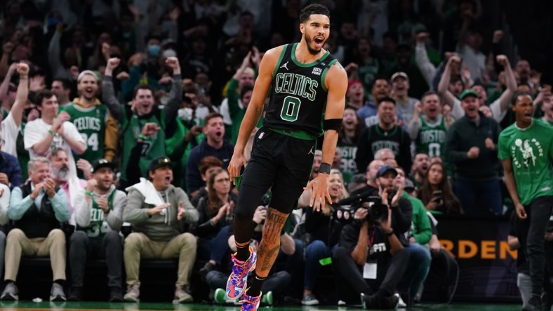 Apr 17, 2022; Boston, Massachusetts, USA; Boston Celtics forward Jayson Tatum (0) reacts after a play against the Brooklyn Nets in the first quarter during game one of the first round for the 2022 NBA playoffs at TD Garden. Mandatory Credit: David Butler II-USA TODAY Sports