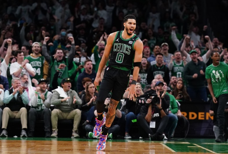 Apr 17, 2022; Boston, Massachusetts, USA; Boston Celtics forward Jayson Tatum (0) reacts after a play against the Brooklyn Nets in the first quarter during game one of the first round for the 2022 NBA playoffs at TD Garden. Mandatory Credit: David Butler II-USA TODAY Sports