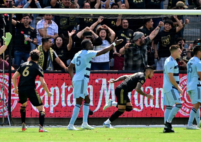 Apr 17, 2022; Los Angeles, California, USA;   Fans celebrate after a goal by Los Angeles FC forward Cristian Arango (9) in the first half of the game against the Sporting Kansas City at Banc of California Stadium. Mandatory Credit: Jayne Kamin-Oncea-USA TODAY Sports