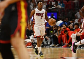 Apr 17, 2022; Miami, Florida, USA; Miami Heat guard Kyle Lowry (7) brings the ball up the court during the first half of game one of the first round for the 2022 NBA playoffs against the Atlanta Hawks at FTX Arena. Mandatory Credit: Jim Rassol-USA TODAY Sports