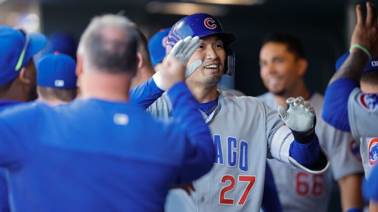 Apr 17, 2022; Denver, Colorado, USA; Chicago Cubs right fielder Seiya Suzuki (27) celebrates in the dugout after hitting a solo home run in the seventh inning against the Colorado Rockies at Coors Field. Mandatory Credit: Isaiah J. Downing-USA TODAY Sports