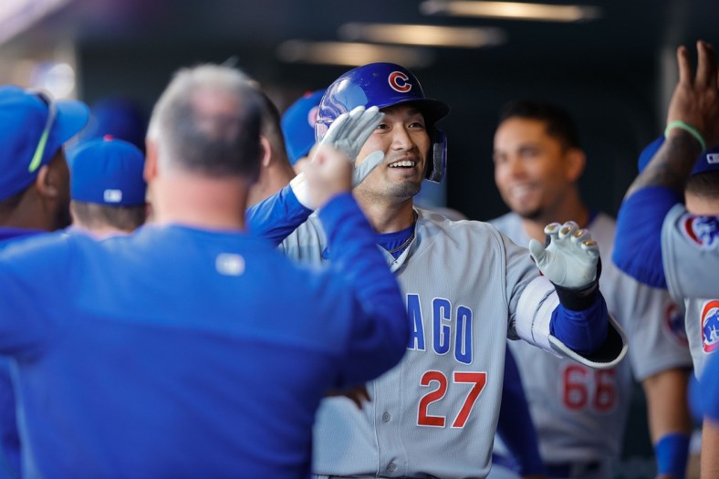 Apr 17, 2022; Denver, Colorado, USA; Chicago Cubs right fielder Seiya Suzuki (27) celebrates in the dugout after hitting a solo home run in the seventh inning against the Colorado Rockies at Coors Field. Mandatory Credit: Isaiah J. Downing-USA TODAY Sports