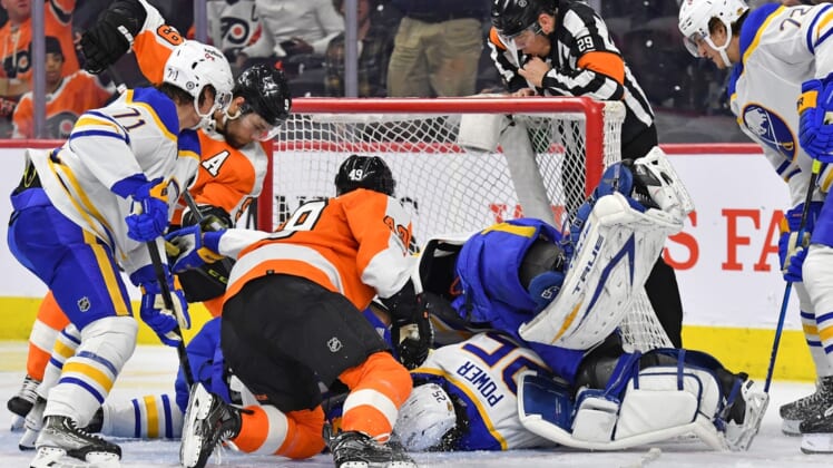 Apr 17, 2022; Philadelphia, Pennsylvania, USA; Philadelphia Flyers left wing Noah Cates (49) scores a goal against the Buffalo Sabres during the second period at Wells Fargo Center. Mandatory Credit: Eric Hartline-USA TODAY Sports