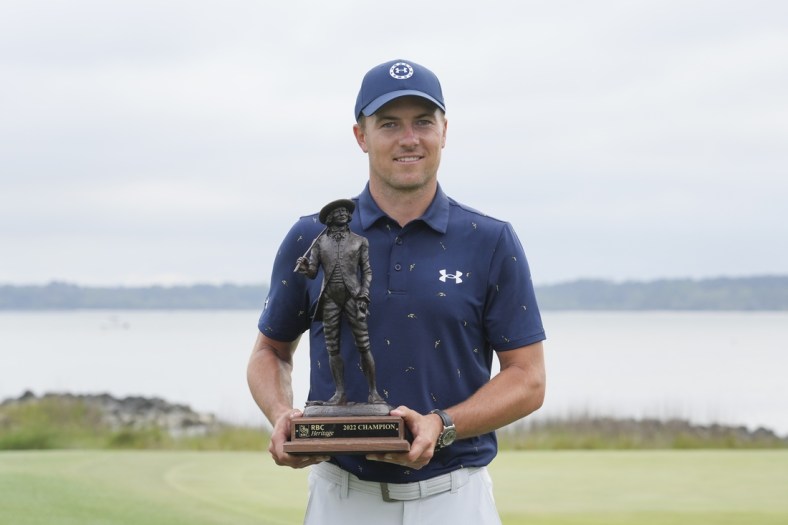 Apr 17, 2022; Hilton Head, South Carolina, USA; Jordan Spieth holds the champions trophy after winning the RBC Heritage golf tournament. Mandatory Credit: David Yeazell-USA TODAY Sports