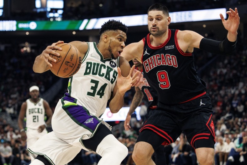 Apr 17, 2022; Milwaukee, Wisconsin, USA; Milwaukee Bucks forward Giannis Antetokounmpo (34) drives for the basket against Chicago Bulls center Nikola Vucevic (9) during the second quarter during game one of the first round for the 2022 NBA playoffs at Fiserv Forum. Mandatory Credit: Jeff Hanisch-USA TODAY Sports