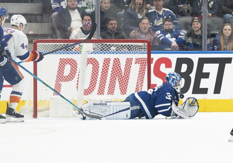 Apr 17, 2022; Toronto, Ontario, CAN; Toronto Maple Leafs goaltender Jack Campbell (36) stops the puck during the first period against the New York Islanders at Scotiabank Arena. Mandatory Credit: Nick Turchiaro-USA TODAY Sports