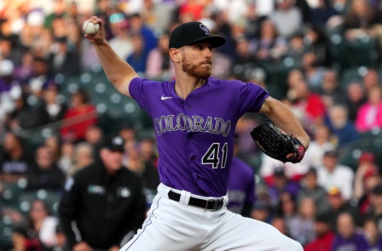 Apr 18, 2022; Denver, Colorado, USA; Colorado Rockies starting pitcher Chad Kuhl (41) delivers a pitch in the first inning against the Philadelphia Phillies at Coors Field. Mandatory Credit: Ron Chenoy-USA TODAY Sports