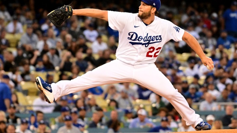 Apr 18, 2022; Los Angeles, California, USA; Los Angeles Dodgers starting pitcher Clayton Kershaw (22) throws during the first inning against the Atlanta Braves at Dodger Stadium. Mandatory Credit: Richard Mackson-USA TODAY Sports