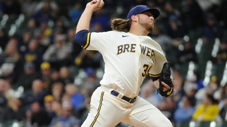 Apr 19, 2022; Milwaukee, Wisconsin, USA; Milwaukee Brewers starting pitcher Corbin Burnes (39) pitches in the seventh inning against the Pittsburgh Pirates at American Family Field. Mandatory Credit: Michael McLoone-USA TODAY Sports