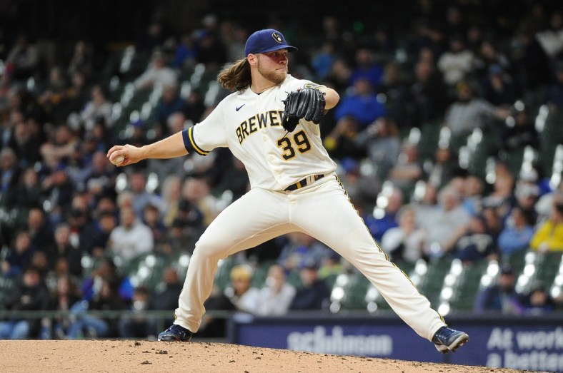 Apr 19, 2022; Milwaukee, Wisconsin, USA; Milwaukee Brewers starting pitcher Corbin Burnes (39) pitches in the seventh inning against the Pittsburgh Pirates at American Family Field. Mandatory Credit: Michael McLoone-USA TODAY Sports